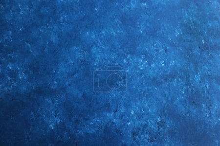 Medium density fiberboard surface with shades of blue,flat layout.
