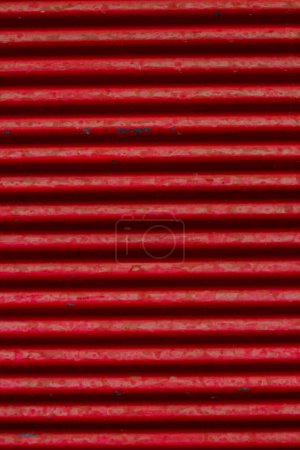 Téléchargez les photos : Closed red color,aluminum shutter of the building,backgrounds.Vertical image - en image libre de droit