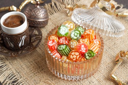 A sixteenth-century flavor Traditional Turkish Hard Colorful Candy is Akide in glass bowl with Turkish Coffee