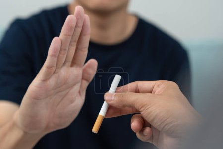 Photo for No smoking. Man stop smoke, refuse, reject, break take cigarette, say no. quit smoking for health. world tobacco day. drugs, Lung Cancer, emphysema , Pulmonary disease, narcotic, nicotine effect - Royalty Free Image