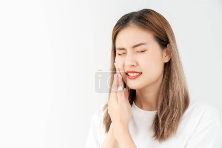 Foto de Asian woman feel toothache from gingivitis, female suffer tooth, decay problems, dental care. sensitive tooth, decay problem, bad breath, Gingival Recession, Oral Hygiene instruction, tooth extraction - Imagen libre de derechos