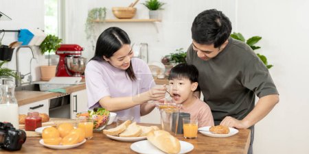 activities together during the holidays. Parents and children are having a meal together during the holidays. New home for family on morning, enjoy, weekend, vacant, family time, happy.