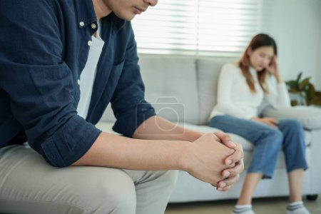 Divorce. Asian couples are desperate and disappointed after marriage. Husband and wife are sad, upset and frustrated after quarrels. distrust, love problems, betrayals. family problem, teenage love