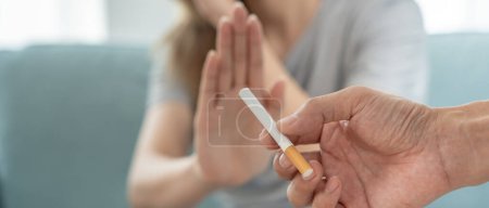 No smoking. Woman stop smoke, refuse, reject, break take cigarette, say no. quit smoking for health. world tobacco day. drugs, Lung Cancer, emphysema , Pulmonary disease, narcotic, nicotine effect