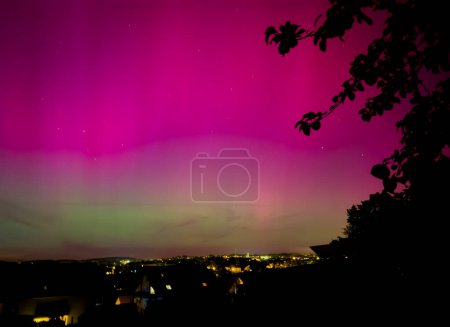 northern lights over the field in the night in Vogtland Reichenbach germany