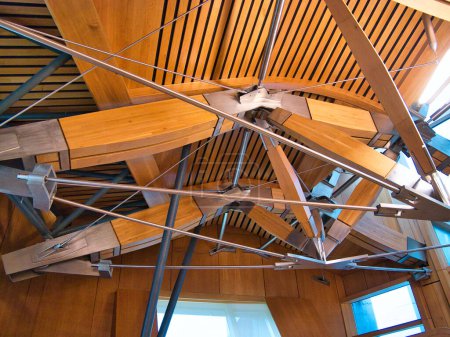 Photo for Oak beams and stainless steel connectors in the roof of the debating chamber in the Scottish Parliament Building at Holyrood, Edinburgh, Scotland, UK. - Royalty Free Image