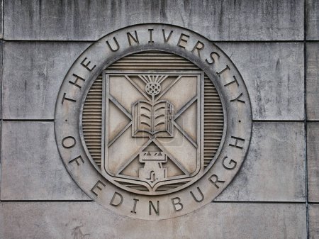 Photo for On the wall at the entrance to St Leonard's Land in Holyrood Road, the coat of arm of the University of Edinburgh. - Royalty Free Image