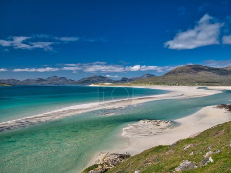 Photo for The white sands and turquoise waters of the pristine Luskentyre Bay in the Outer Hebrides. Taken on a sunny day in summer. - Royalty Free Image