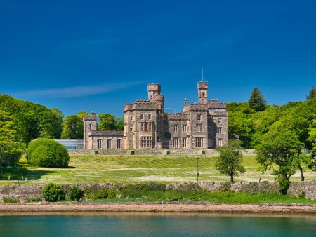 Photo for The frontage of the category A listed building Lews Castle in Stornoway on Isle of Lewis in the Outer Hebrides, Scotland, UK. Taken on sunny day in summer with a blue sky. - Royalty Free Image