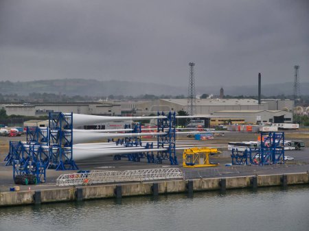 Photo for Wind turbine blades stacked for shipping at the Port of Belfast, Northern Ireland, UK - Royalty Free Image