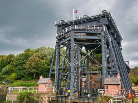 Photo for The Anderton Boat Lift near Northwich in Cheshire, UK. A two-caisson lift lock providing a 50-foot vertical link between the River Weaver and the Trent and Mersey Canal. - Royalty Free Image