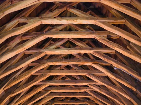 Photo for York, UK - Nov 23 2023: Scissor-braced trusses in the medieval roof of the Masons' Loft on the first floor of the L-shaped Chapter House vestibule building at York Minster. - Royalty Free Image