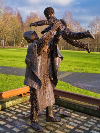 Photo for St Helens, UK - Jan 4 2024: The Worker's Memorial Statue in St Helens, England, UK. A memorial to workers who have lost their lives at work or suffered from work-related injury and disease. - Royalty Free Image