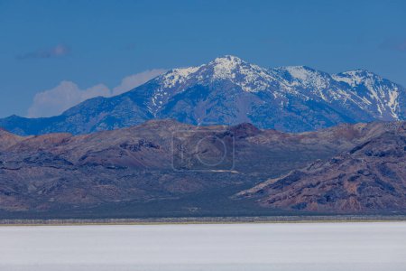 Landscape of the Bonneville Salt Flats in eastern Utah with Silver Island Mountain Range in the background