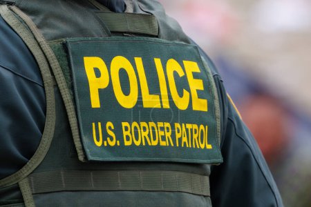 Photo for San Diego, California, USA  - May 12 2023: Close up of Border Patrol patch on uniform at the San Diego, CA and Mexico international border wall after title 42 policy has expired. - Royalty Free Image