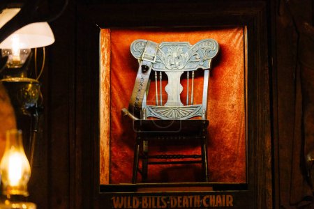 Photo for Deadwood, South Dakota, USA  - May 19 2023: Death chair of Wild Bill Hickok in the No. 10 saloon. - Royalty Free Image