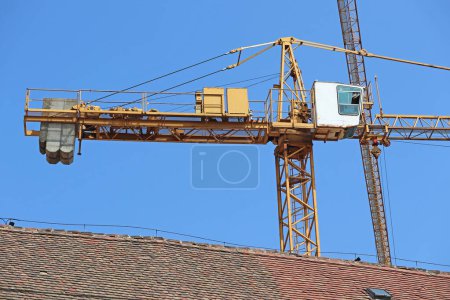 Photo for Tower crane at the construction site - Royalty Free Image