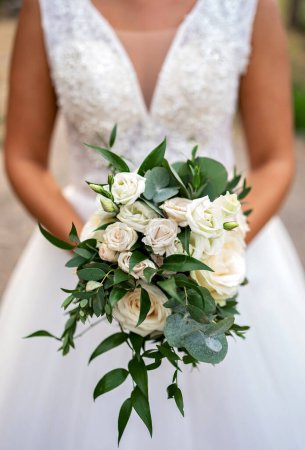Photo for Bride with a bouquet of flower - Royalty Free Image