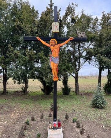 Jesus Christ figurine on a cross in the public cemetery