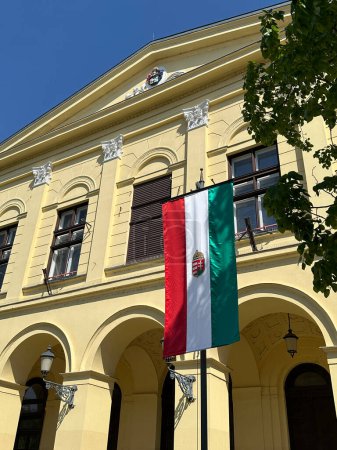City hall of Debrecen with the flag of Hungary