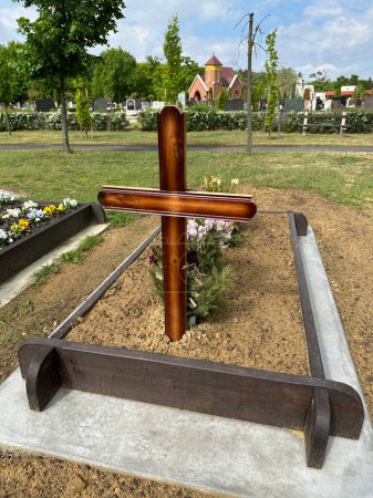 Wooden cross in the public cemetery