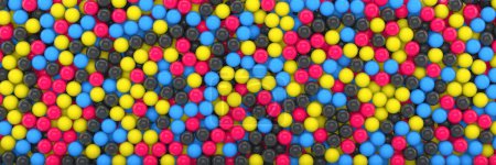 3D-Darstellung vieler farbiger Kugeln in cmyk - abstrakter Hintergrund.