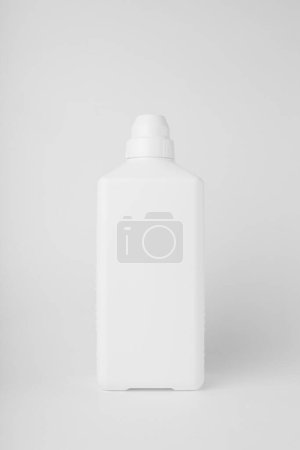 White plastic bottle mockup, front view standing on white background, vertical. Bottle template for washing, sanitizer, cleanser, medicine cosmetic for design, advertising, branding, displaying. 
