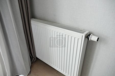 Photo for Heating radiator under window in the room. High quality photo - Royalty Free Image