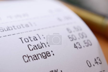Photo for Closeup of Sales receipts on table - Royalty Free Image