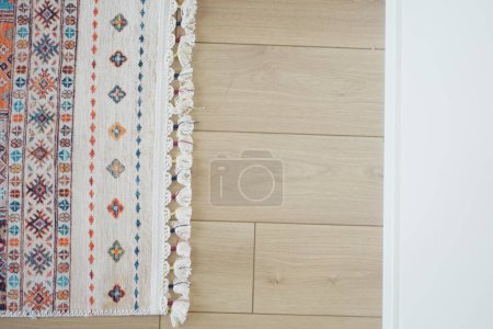 carpet texture background on wooden floor with copy space .
