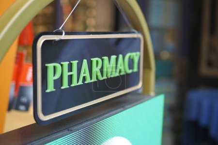 pharmacy sign on shop in street,