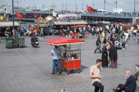 Photo for Boat fish restaurant at Galata bridge Eminonu Golden Horn Istanbul. - Royalty Free Image