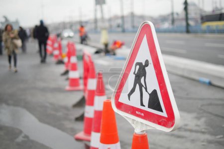  traffic sign on street with construction site.