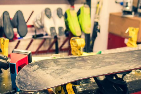 Photo for Close up waxed snowboard on repair workshop table. Step by step guide - Royalty Free Image