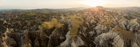 Téléchargez les photos : Aerial cinematic top view mountain canyons. Stone texture and pattern with sunset over horizon.Vashlovani national park - en image libre de droit