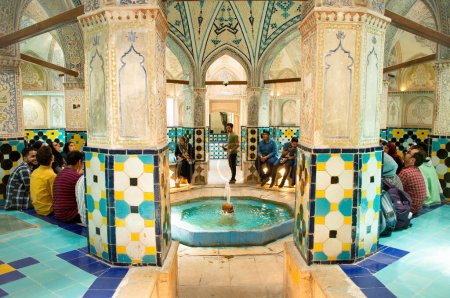 Photo for Kashan, Iran - 29th june, 2022: .Muslim tourist visit Sultan Amir Ahmad Bathhouse. Group of tourist visit famous bathhouse in Kashan with tout Guide explain - Royalty Free Image