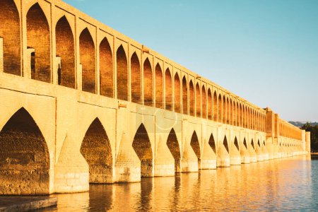 Photo for Isfahan, Iran - May 2022: SioSe Pol or Bridge of 33 arches, one of the oldest bridges of Esfahan and longest bridge on Zayandeh River - Royalty Free Image