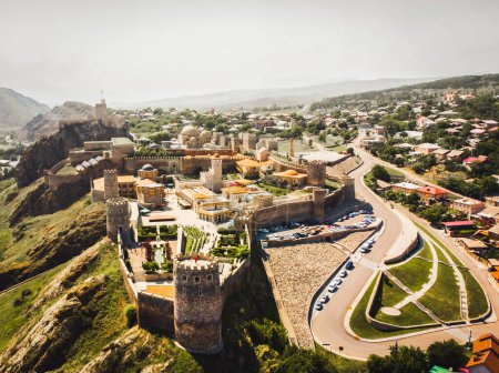 Aerial panning view Akhaltsikhe town panorama with famous tourist attraction Rabati castle in summer
