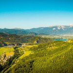 Green spring nature in europe in clear sky morning. Road way to Triglav national park in Slovenia. Famous summer travel destination