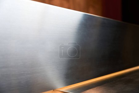 Photo for Metal decorative surface at the reception desk, modern materials used for the counter - Royalty Free Image