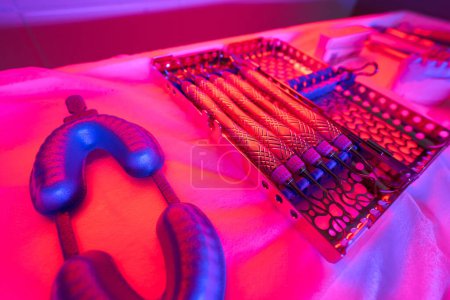 Photo for Dental instruments are laid out for sterilization by an infrared lamp, they are made of environmentally friendly materials - Royalty Free Image