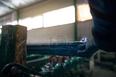 Photo for Special processing of double-glazed windows in a window production workshop, special tools are used - Royalty Free Image