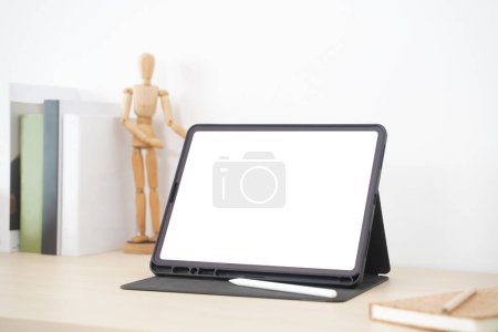 Photo for Blank screen tablet with digital pencil on the table. - Royalty Free Image