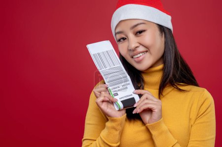 Photo for Gift delivery. Cute smiling woman holding a barcode in hands - Royalty Free Image