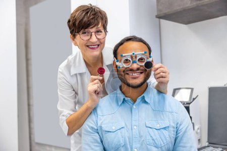 Photo for Measurements. Female optometrist working with a male patient - Royalty Free Image