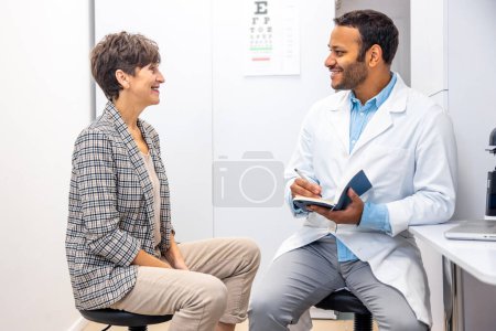 Photo for Visit to a doctor. Mid aged woman having a visti to ophtalmologist - Royalty Free Image
