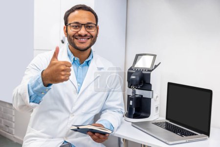 Photo for Male doctor. Male doctor in eye glasses looking positive and friendly - Royalty Free Image