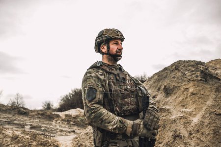 Photo for On a position. A soldier standing in a dig-position - Royalty Free Image