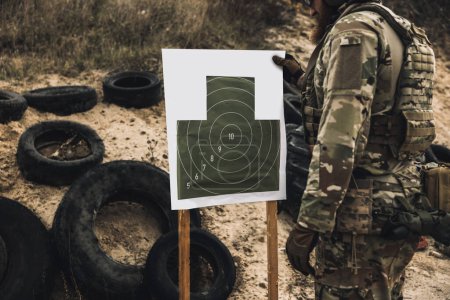 Photo for Target. Soldier marking the target for shooting - Royalty Free Image