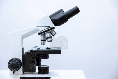 Photo for Image of microscope, chemistry, pharmaceutical instrument, microbiology magnifying tool. Copy space. - Royalty Free Image